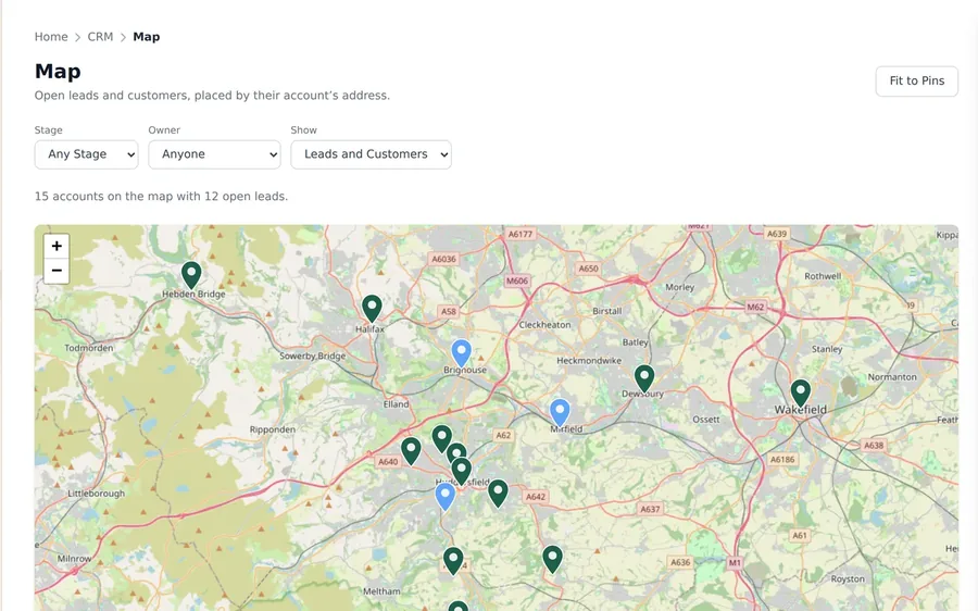 A map of West Yorkshire with pins for customers and open leads.